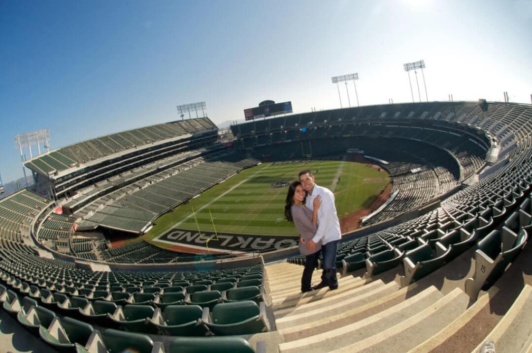 A couple gets engaged at the Oakland Coliseum