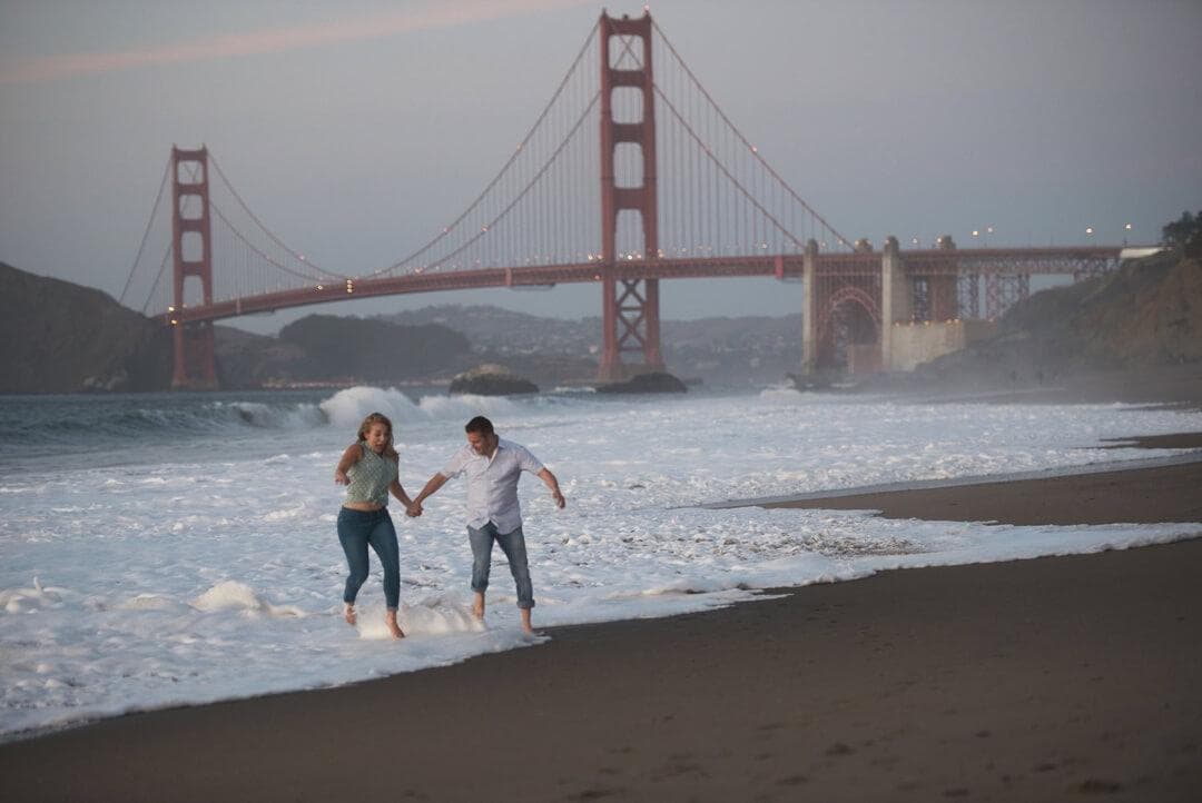 A couple gets engaged on Baker Beach