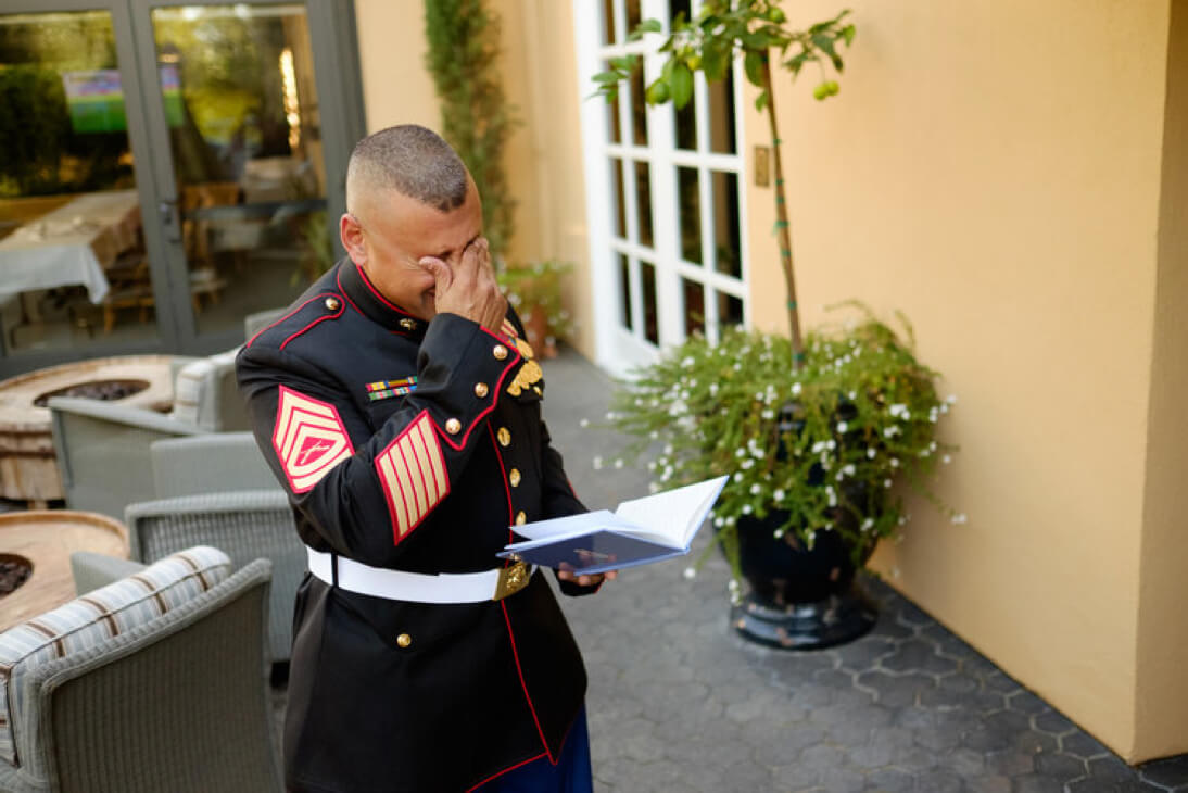 A Marine cries as he practices his wedding vows