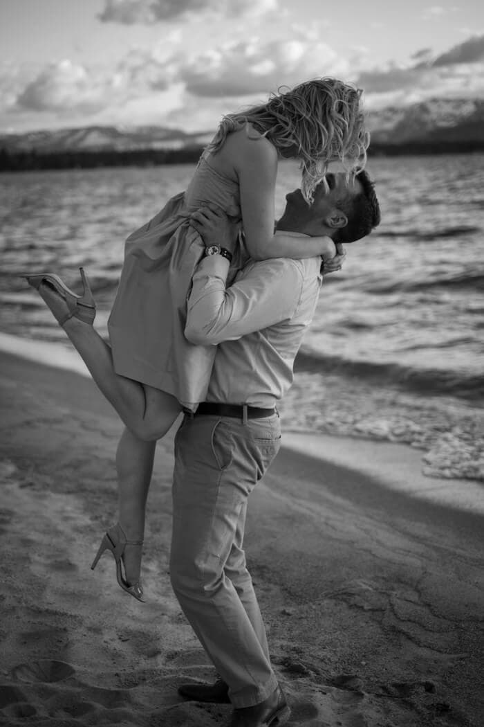 A couple gets engaged at a California beach